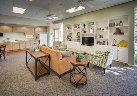 a living room with a couch and a table